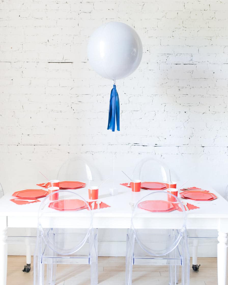 16in White Orb Foil Balloon and Navy Skirt Centerpiece | Purchase
